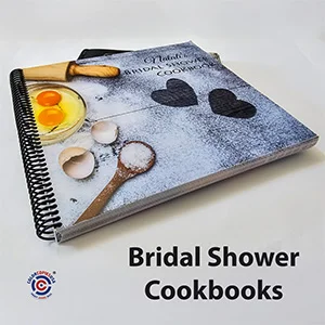 Spiral-bound cookbook for a bridal shower with baking ingredients