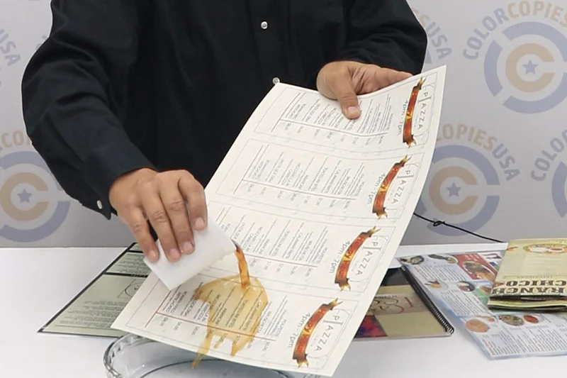 Waterproof synthetic menu - coffee spilled with no damage