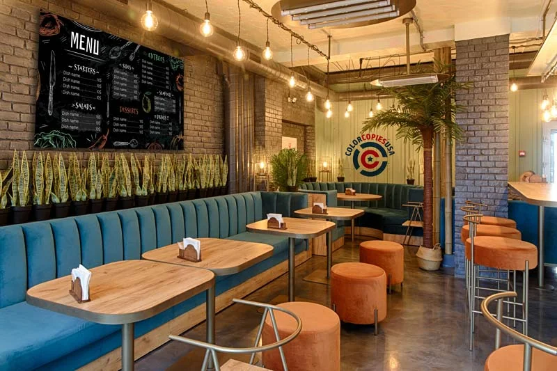 Large indoor vinyl banner in a restaurant dining room Large vinyl banner in a restaurant dining room showing a food menu