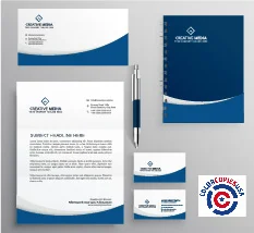 The picture shows items that belong to an identity kit or pattern that we suggest businesses develop in order to function as a healthy company. There is an envelope, letterhead, business cards, notepages and pens