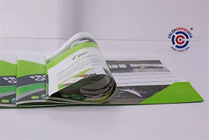 Stack of professionally printed saddle stitch catalogs showing their slim profile