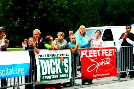 A group of advertising banners on a street event